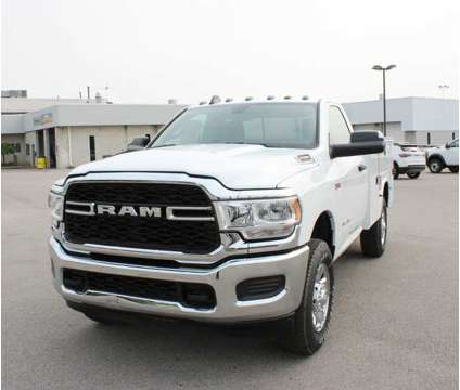 2022 Ram 2500 Tradesman is a White 2022 RAM 2500 Model Tradesman Truck in Bay City MI