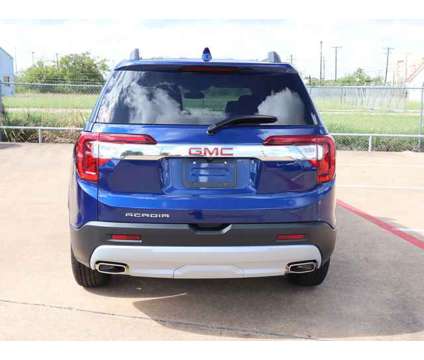 2023 GMC Acadia SLT is a Blue 2023 GMC Acadia SLT SUV in Bay City TX