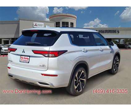 2024 Mitsubishi Outlander PHEV SEL is a White 2024 Mitsubishi Outlander SEL SUV in Plano TX