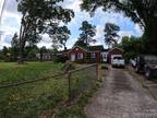 Gastonia, 3 bedroom brick house sitting on commercial land