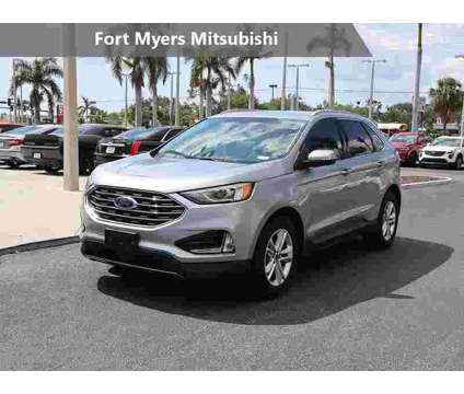 2020 Ford Edge SEL is a Silver 2020 Ford Edge SEL SUV in Fort Myers FL