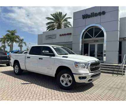 2024 Ram 1500 Big Horn/Lone Star is a White 2024 RAM 1500 Model Big Horn Truck in Stuart FL