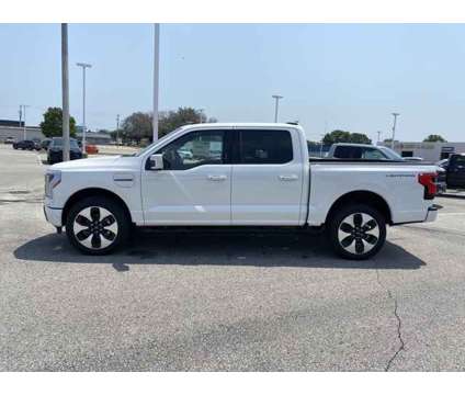 2023 Ford F-150 Lightning Platinum is a White 2023 Ford F-150 Platinum Truck in Fort Dodge IA