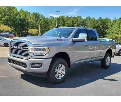 2024 Ram 3500 Laramie is a Silver 2024 RAM 3500 Model Laramie Truck in Wake Forest NC