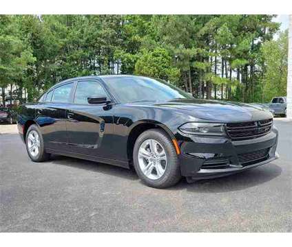 2023 Dodge Charger SXT is a Black 2023 Dodge Charger SXT Sedan in Wake Forest NC