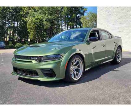 2023 Dodge Charger R/T Scat Pack Widebody is a Green 2023 Dodge Charger R/T Scat Pack Sedan in Wake Forest NC