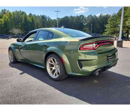2023 Dodge Charger R/T Scat Pack Widebody is a Green 2023 Dodge Charger R/T Scat Pack Sedan in Wake Forest NC