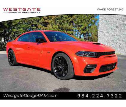 2023 Dodge Charger R/T Scat Pack Widebody is a Gold 2023 Dodge Charger R/T Scat Pack Sedan in Wake Forest NC