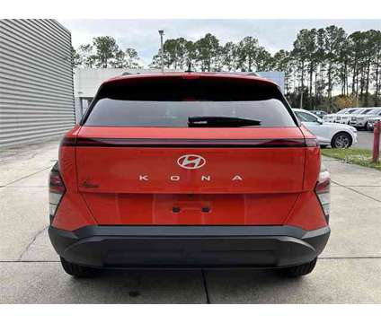 2024 Hyundai Kona SEL is a Orange 2024 Hyundai Kona SEL SUV in Gainesville FL