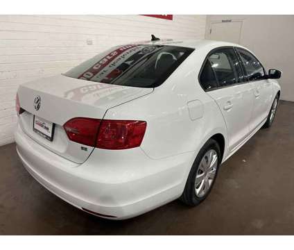 2014 Volkswagen Jetta 1.8T SE is a White 2014 Volkswagen Jetta 1.8T SE Sedan in Chandler AZ