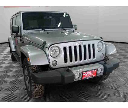 2018 Jeep Wrangler JK Unlimited Sahara is a Silver 2018 Jeep Wrangler Unlimited Sahara SUV in Fergus Falls MN