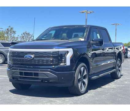 2023 Ford F-150 Lightning Platinum is a Blue 2023 Ford F-150 Platinum Truck in Zelienople PA