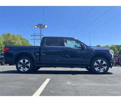 2023 Ford F-150 Lightning Platinum is a Blue 2023 Ford F-150 Platinum Truck in Zelienople PA