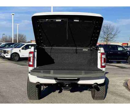 2023 Ford F-150 Lariat BLACK OPS is a White 2023 Ford F-150 Lariat Truck in Fort Dodge IA