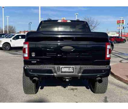 2023 Ford F-150 Lariat BLACK OPS is a Black 2023 Ford F-150 Lariat Truck in Fort Dodge IA