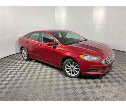 2017 Ford Fusion SE is a Red 2017 Ford Fusion SE Sedan in Athens OH