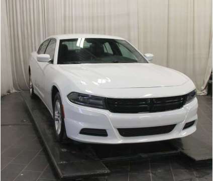 2021 Dodge Charger SXT is a White 2021 Dodge Charger SXT Sedan in Bay City MI