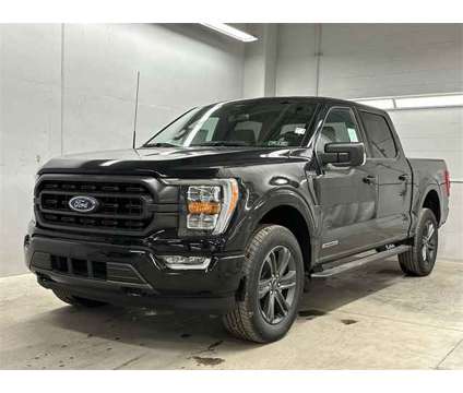2023 Ford F-150 XLT is a Black 2023 Ford F-150 XLT Hybrid in Zelienople PA