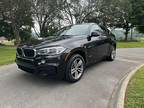 2016 BMW X6 sDrive35i Experience the epitome of luxury and performance with the
