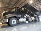 2015 CAT CT660S Heavy Spec,60,000lbs Roll- off,Automatic.triaxle