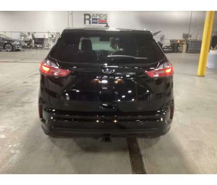 2024 Ford Edge ST Line is a Black 2024 Ford Edge SUV in Wisconsin Rapids WI