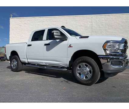 2024 Ram 3500 Tradesman is a White 2024 RAM 3500 Model Tradesman Truck in Wake Forest NC