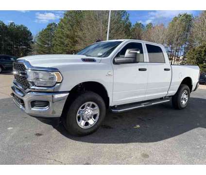 2024 Ram 3500 Tradesman is a White 2024 RAM 3500 Model Tradesman Truck in Wake Forest NC