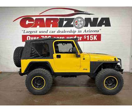 2004 Jeep Wrangler Rubicon is a Yellow 2004 Jeep Wrangler Rubicon SUV in Chandler AZ