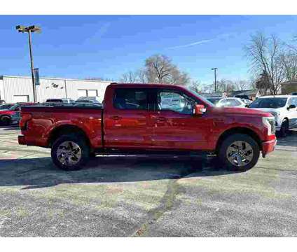 2023 Ford F-150 Lightning Lariat AWD is a Red 2023 Ford F-150 Lariat Truck in Manteno IL