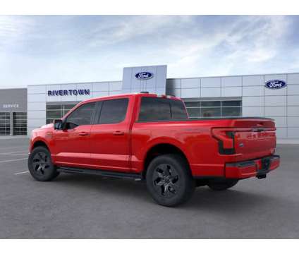2023NewFordNewF-150 LightningNew4WD SuperCrew 5.5 Box is a Red 2023 Ford F-150 Lariat Car for Sale in Columbus GA