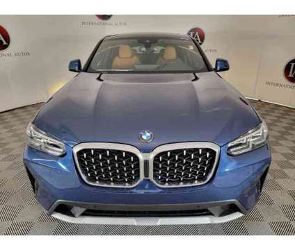2024 BMW X4 xDrive30i is a Blue 2024 BMW X4 xDrive30i SUV in Milwaukee WI
