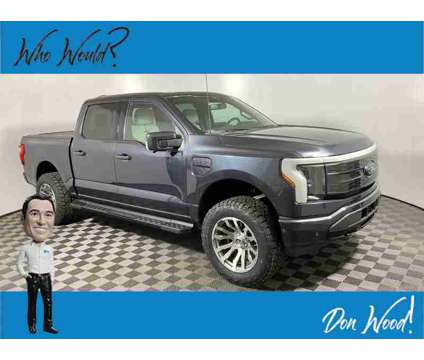 2022 Ford F-150 Lightning Platinum is a White 2022 Ford F-150 Platinum Truck in Athens OH