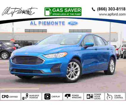 2020 Ford Fusion SE is a Blue 2020 Ford Fusion SE Sedan in Melrose Park IL