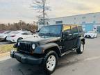 2013 Jeep Wrangler Unlimited Sport 4x4 4dr SUV