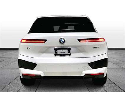 2024 BMW iX xDrive50 is a White 2024 BMW 325 Model iX SUV in Grand Blanc MI