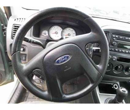 2007 Ford Escape XLS is a Blue 2007 Ford Escape XLS SUV in Independence KS