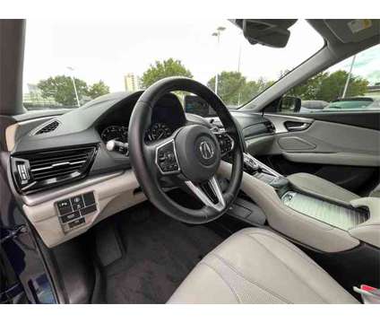 2024 Acura RDX Technology Package SH-AWD is a Blue 2024 Acura RDX Technology Package SUV in Houston TX