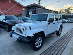 2014 Jeep Wrangler Unlimited Sahara Sport Utility 4D