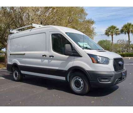 2023 Ford Transit Cargo Van Base Rear-Wheel Drive Medium Roof Van 148 in. WB is a White 2023 Ford Transit Van in Estero FL