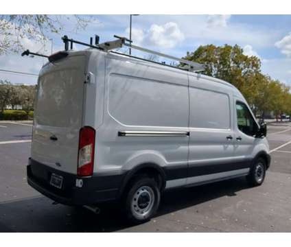 2023 Ford Transit Cargo Van Base Rear-Wheel Drive Medium Roof Van 148 in. WB is a White 2023 Ford Transit Van in Estero FL