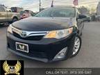 Used 2013 Toyota Camry Hybrid for sale.
