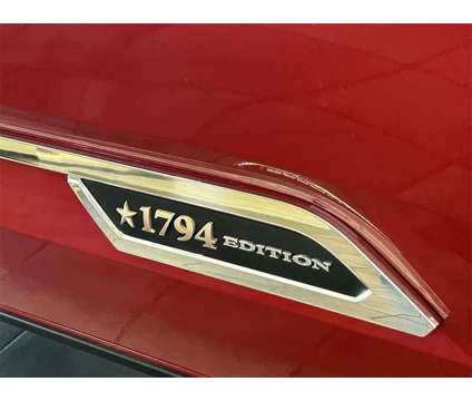 2024 Toyota Tundra Hybrid 1794 Edition is a Red 2024 Toyota Tundra 1794 Trim Hybrid in Richardson TX