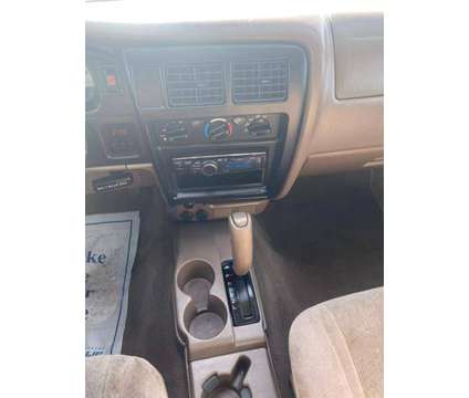 2004 Toyota Tacoma Double Cab for sale is a Gold 2004 Toyota Tacoma Double Cab Car for Sale in Farmington NM