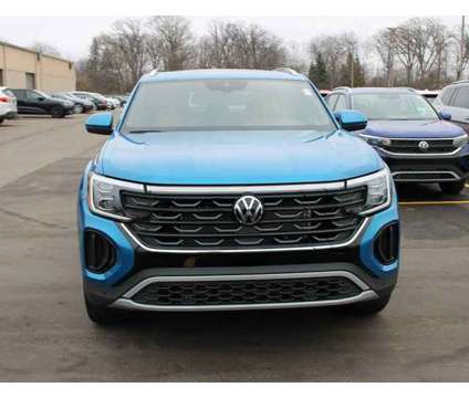 2024 Volkswagen Atlas Cross Sport 2.0T SE w/Technology is a Blue 2024 Volkswagen Atlas 2.0T SE SUV in Bay City MI