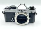 Chrome Nikon FE SLR film camera; body only, lens is not included - Very Good