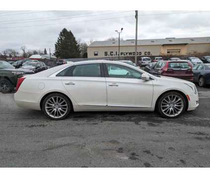 2015 Cadillac XTS Platinum is a White 2015 Cadillac XTS Platinum Car for Sale in Utica, NY NY