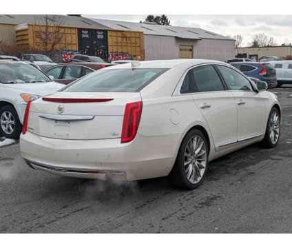 2015 Cadillac XTS Platinum is a White 2015 Cadillac XTS Platinum Car for Sale in Utica, NY NY