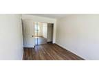 Large Upstairs Corner Unit in Highly Desirable PB Location