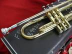 King 600 trumpet with mouthpiece and case.