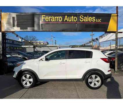 2013 Kia Sportage for sale is a White 2013 Kia Sportage 4dr Car for Sale in Jersey City NJ